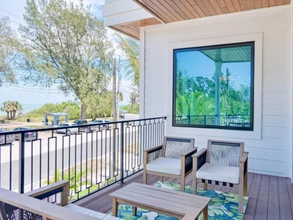 Anna Maria Island Luxury Vacation Rental Beachfront Home with Pool & Rooftop Deck