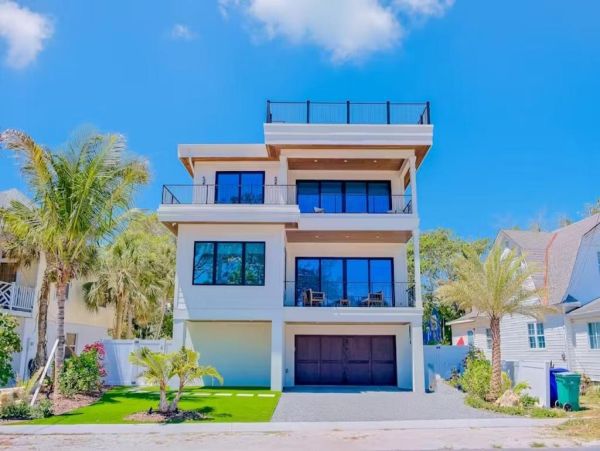 Anna Maria Island Luxury Vacation Rental Beachfront Home with Pool & Rooftop Deck