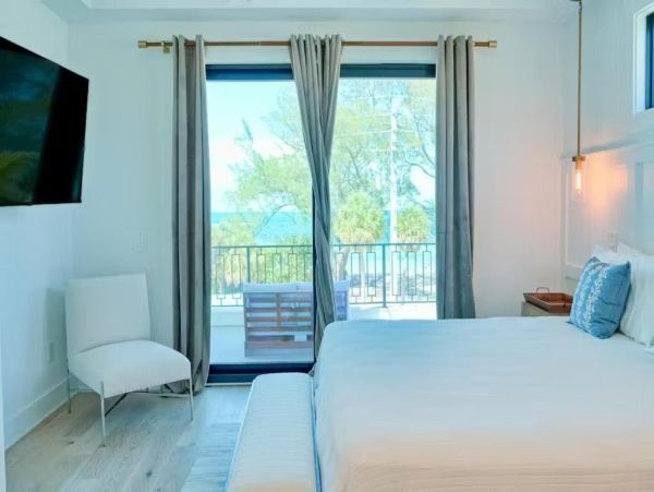 Anna Maria Island Luxury Vacation Rental Beachfront Home with Pool & Rooftop Deck