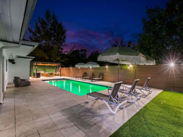 Miami Vacation Rental 6-Bedroom Villa with Tennis Court, Pool & Canal Access