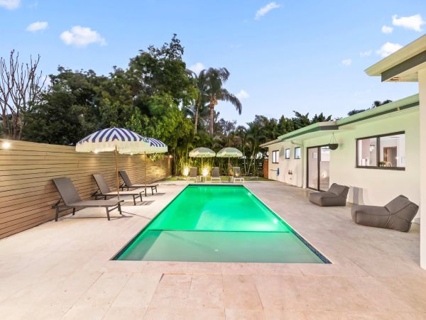 Miami Vacation Rental 6-Bedroom Villa with Tennis Court, Pool & Canal Access