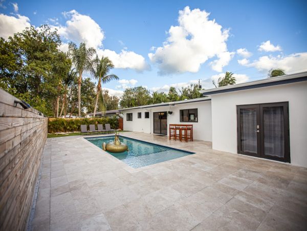 Miami Vacation Rental 6-Bedroom Villa with Tennis Court, Pool & Canal Access