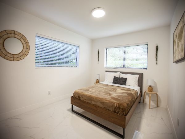 Miami Vacation Rental 6-Bedroom Villa with Tennis Court, Pool & Canal Access