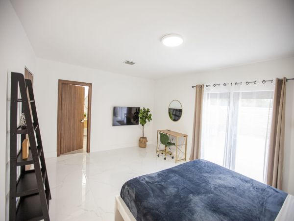 Miami Vacation Rental 6-Bedroom Villa with Tennis Court, Pool & Canal Access