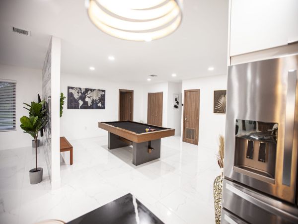 Miami Vacation Rental 6-Bedroom Villa with Tennis Court, Pool & Canal Access