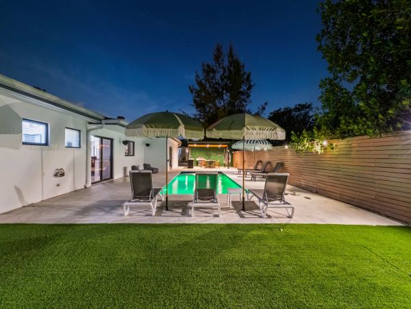 Miami Vacation Rental 6-Bedroom Villa with Tennis Court, Pool & Canal Access