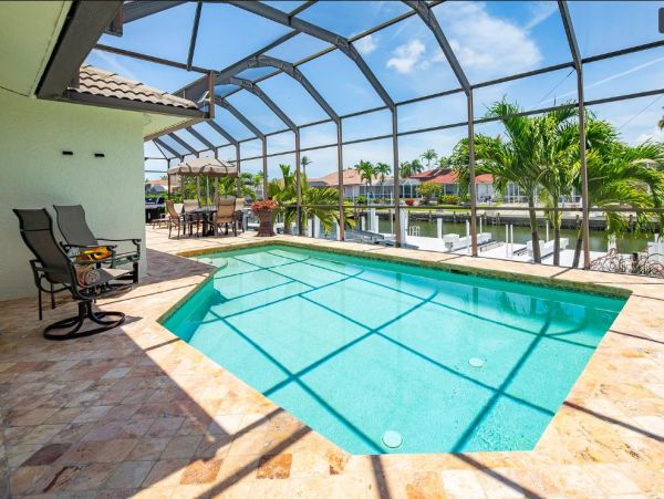 Marco Island Vacation Rental with Pool & Dock 3 Bedroom + Den