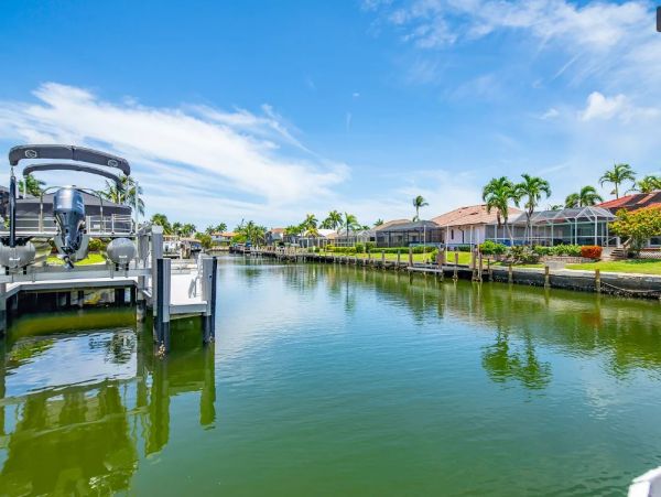 Marco Island Vacation Rental with Pool & Dock 3 Bedroom + Den