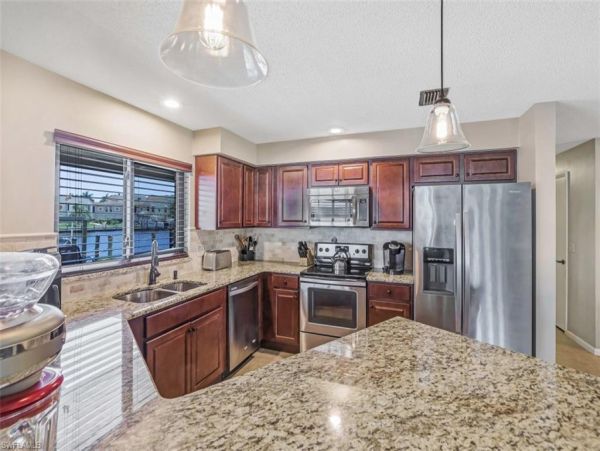 Cape Coral Vacation Rentals | Riverfront 4-Bedroom Home with Pool & Tiki Hut