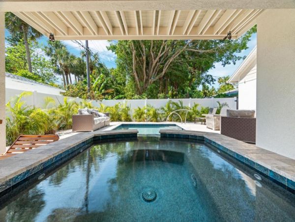 Clearwater Beach Vacation Rental Home with Pool & 4 Bedrooms Steps to the Beach