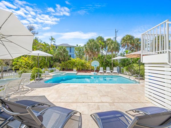 Luxury Captiva Island Vacation Rental with Pool, Hot Tub & Rooftop Deck Steps from the Beach