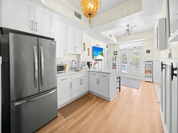 Luxury Captiva Island Vacation Rental with Pool, Hot Tub & Rooftop Deck Steps from the Beach