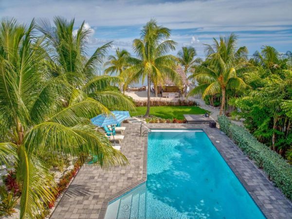 Luxury Waterfront Vacation Rental in Marathon FL Home with Heated Pool and Dock