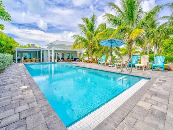 Luxury Waterfront Vacation Rental in Marathon FL Home with Heated Pool and Dock