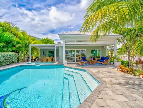 Luxury Waterfront Vacation Rental in Marathon FL Home with Heated Pool and Dock