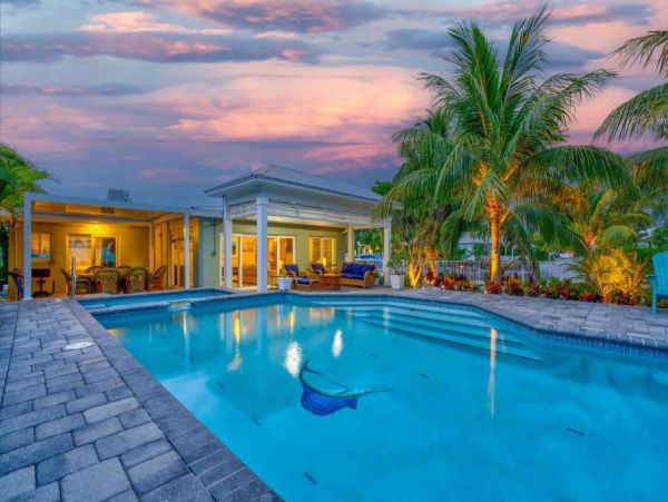 Luxury Waterfront Vacation Rental in Marathon FL Home with Heated Pool and Dock