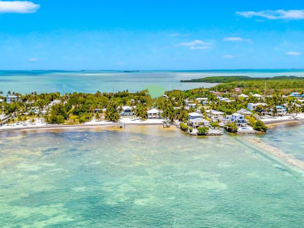 Luxury Private Beachfront  Vacation Home with Heated Pool
