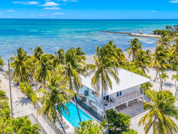 Luxury Private Beachfront  Vacation Home with Heated Pool