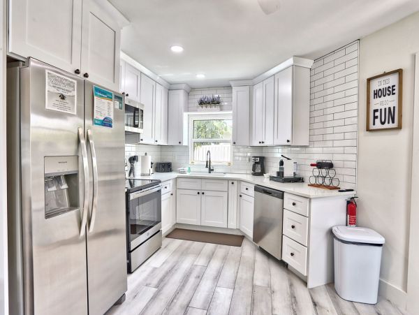 Luxury St. Pete Beach Waterfront Vacation Rental 5-Bedroom Pool Home with Private Dock