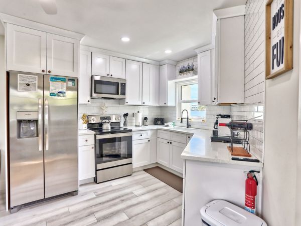 Luxury St. Pete Beach Waterfront Vacation Rental 5-Bedroom Pool Home with Private Dock