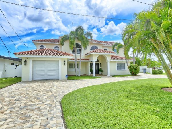 Luxury St. Pete Beach Waterfront Vacation Rental 5-Bedroom Pool Home with Private Dock