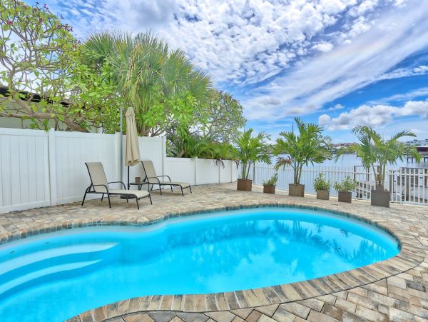 Luxury St. Pete Beach Waterfront Vacation Rental 5-Bedroom Pool Home with Private Dock