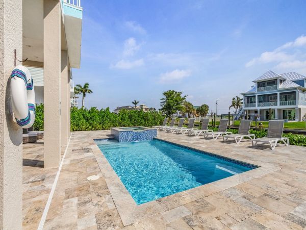 Luxurious Canal-Front Home with Pool - Your Tropical Paradise Awaits