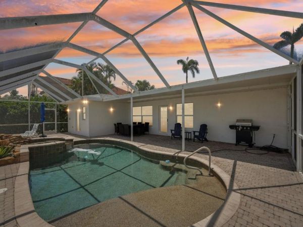 Fort Myers Beach Luxury Canal Front Home - Private Pool, Hot Tub & Dock