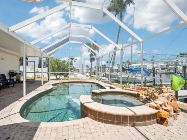 Fort Myers Beach Luxury Canal Front Home - Private Pool, Hot Tub & Dock