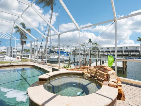 Fort Myers Beach Luxury Canal Front Home - Private Pool, Hot Tub & Dock