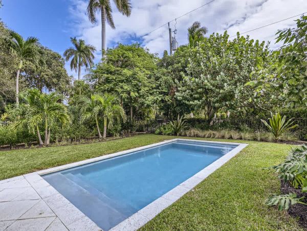 Elegant 3 Bedroom Lake Worth Beach Vacation Home with Pool & Tropical Gardens