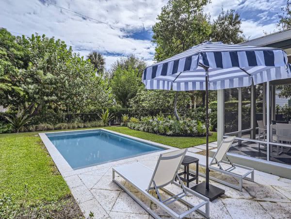 Elegant 3 Bedroom Lake Worth Beach Vacation Home with Pool & Tropical Gardens