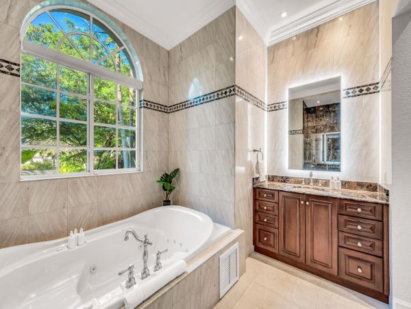 Waterfront Luxury Vacation Rental - Mediterranean - Style Villa with Private Dock