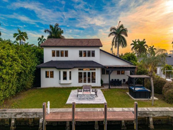 Luxury Waterfront Retreat with Private Dock and Heated Pool