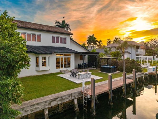 Luxury Waterfront Retreat with Private Dock and Heated Pool