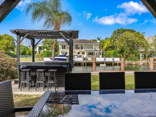 Luxury Waterfront Retreat with Private Dock and Heated Pool