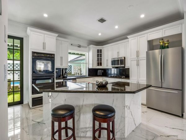 Luxury Waterfront Retreat with Private Dock and Heated Pool