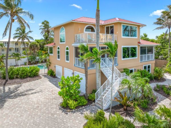 Luxurious Beachfront Four Bedroom Home with Breathtaking Gulf & Bay Views