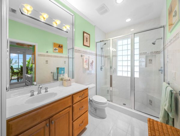 Luxurious Beachfront Four Bedroom Home with Breathtaking Gulf & Bay Views