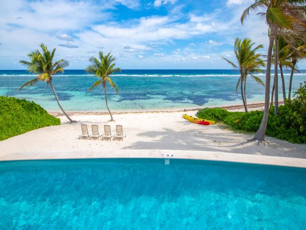 Oceanfront Grand Cayman Luxury Villa Rental - Private Pool & Beachfront Escape