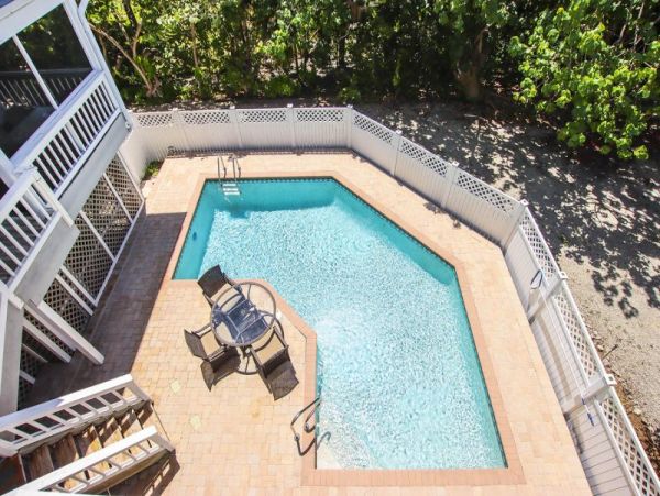 Unique Two-Bedroom With Loft Duplex Home with Heated Pool on Sanibel