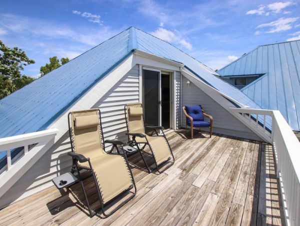 Unique Two-Bedroom With Loft Duplex Home with Heated Pool on Sanibel