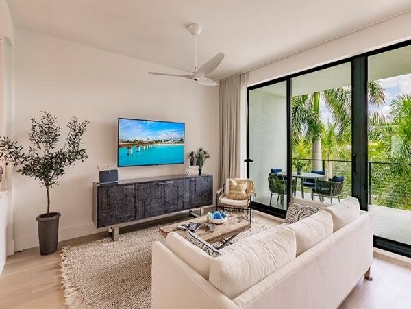 Naples Vacation Luxury Condo Steps from Your Door Call Today