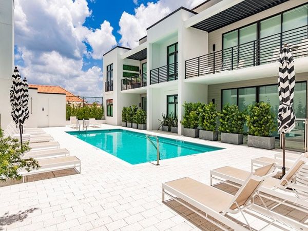 Naples Vacation Luxury Condo Steps from Your Door Call Today