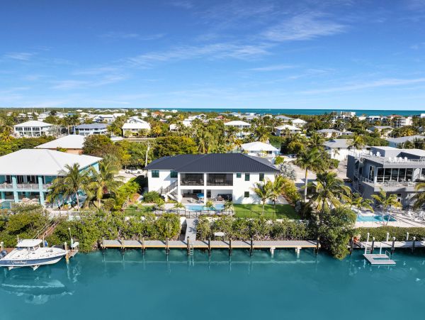 Luxurious Waterfront Retreat in Coco Plum - 5-Bedroom, Private Pool & Dock
