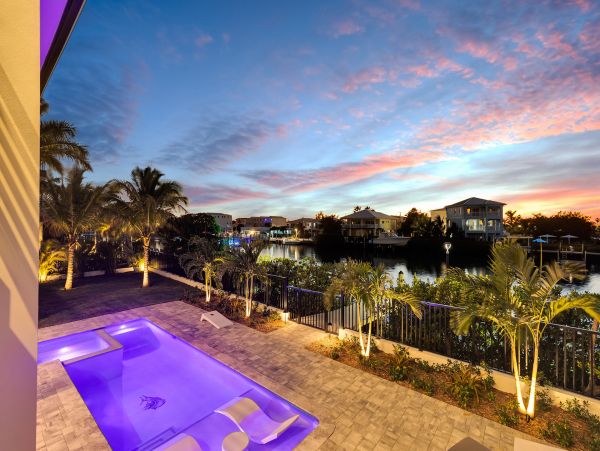 Luxurious Waterfront Retreat in Coco Plum - 5-Bedroom, Private Pool & Dock