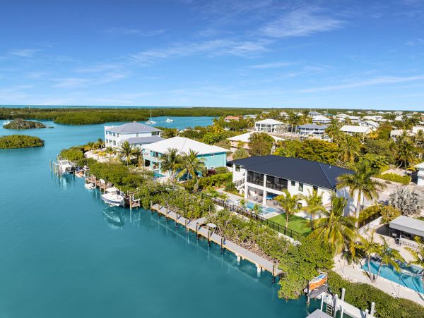Luxurious Waterfront Retreat in Coco Plum - 5-Bedroom, Private Pool & Dock