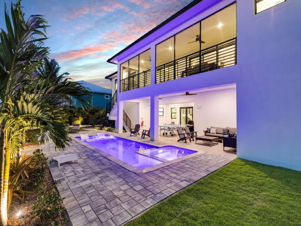 Luxurious Waterfront Retreat in Coco Plum - 5-Bedroom, Private Pool & Dock