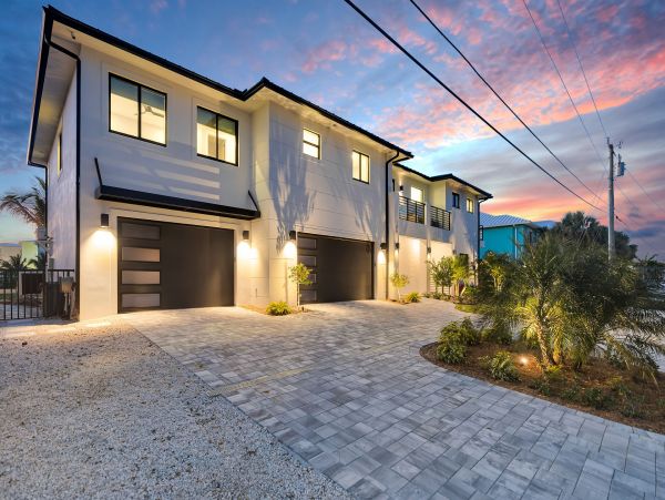 Luxurious Waterfront Retreat in Coco Plum - 5-Bedroom, Private Pool & Dock