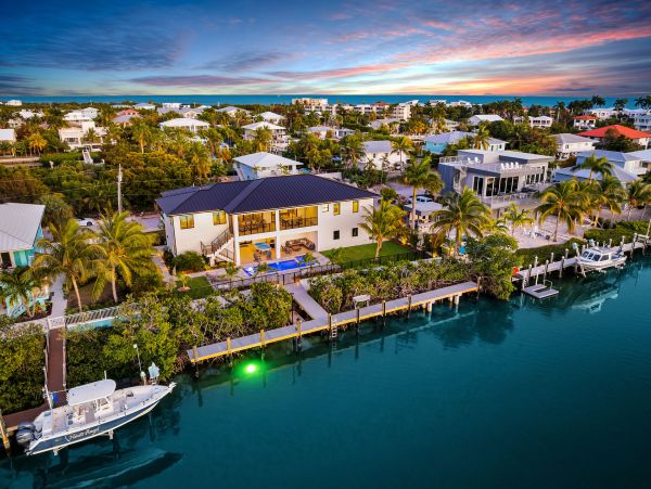 Luxurious Waterfront Retreat in Coco Plum - 5-Bedroom, Private Pool & Dock